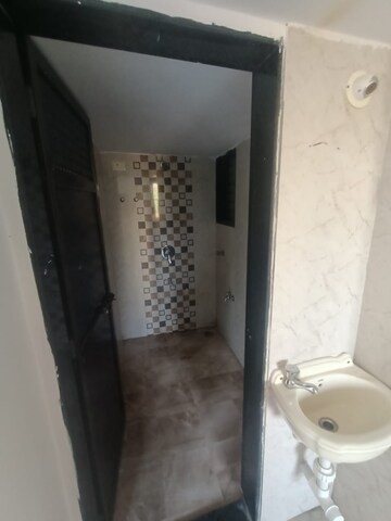 Bathroom in 1 BHK Apartment at Sai Satyam Homes, Kalyan West – for Sale