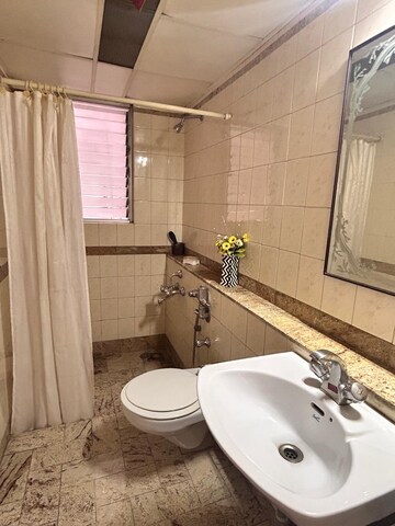 Bathroom in 3 BHK Apartment at Kalpataru Regency I II, Kalyani Nagar – for Rent