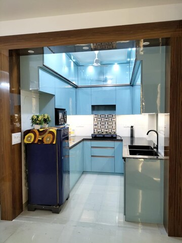 Kitchen in 2 BHK Apartment at Signature The Millennia 2, Sector 37d – for Rent