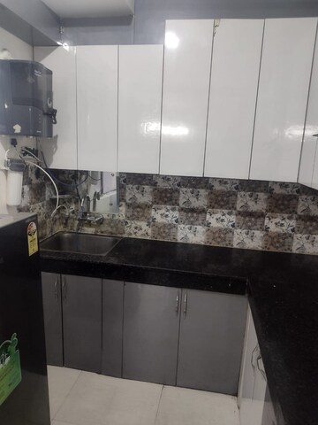 Kitchen in 2 BHK Apartment at Signature The Millennia 2, Sector 37d – for Rent