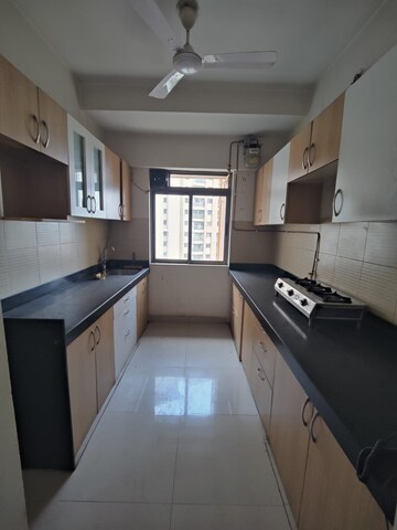 Kitchen in 2 BHK Apartment at Lodha Splendora, Ghodbunder Road – for Rent