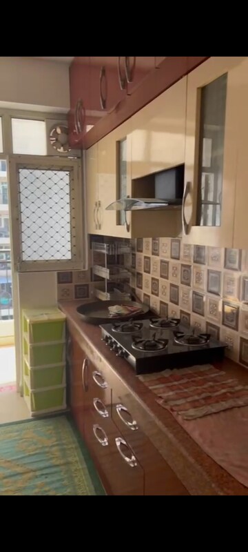 Kitchen in 3 BHK Apartment at Uninav Heights Phase I, Raj Nagar Extension – for Rent
