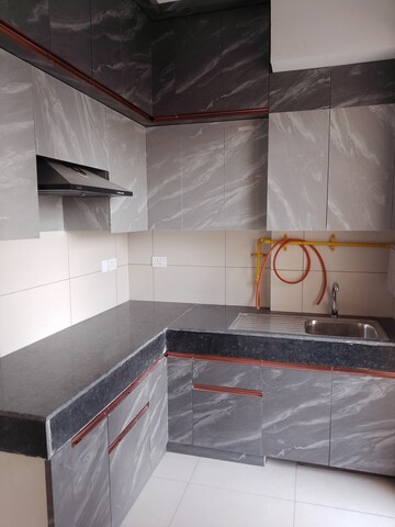 Kitchen in 3 BHK Apartment at Tata Eureka Park, Sector 150 – for Rent