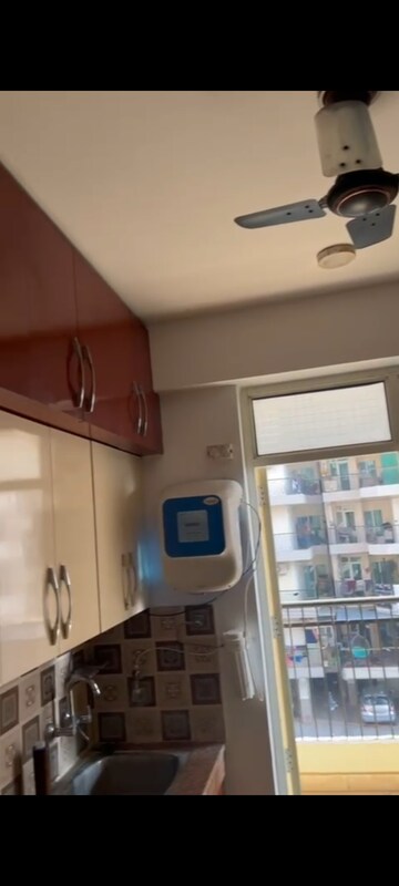 Kitchen in 3 BHK Apartment at Uninav Heights Phase I, Raj Nagar Extension – for Rent