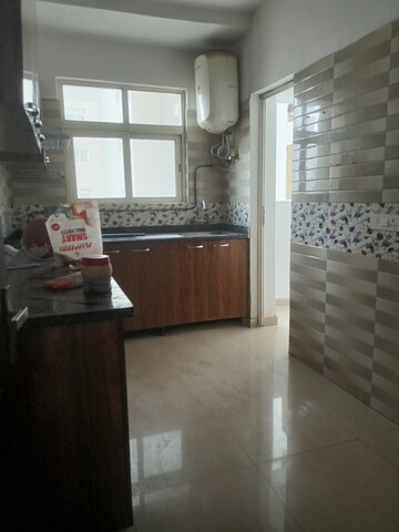Kitchen in 3 BHK Apartment at 3C Lotus Boulevard, Sector 100 – for Rent
