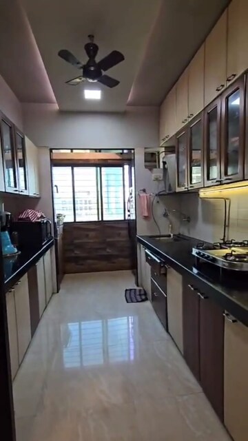 Kitchen in 2 BHK Apartment at Om Shreeji Heights, Mira Road – for Sale