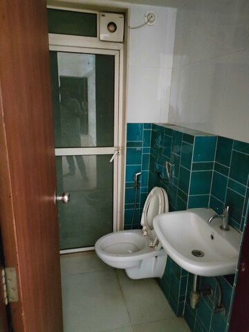 Bathroom in 1.5 BHK Apartment at Lodha Amara, Kolshet Road – for Rent