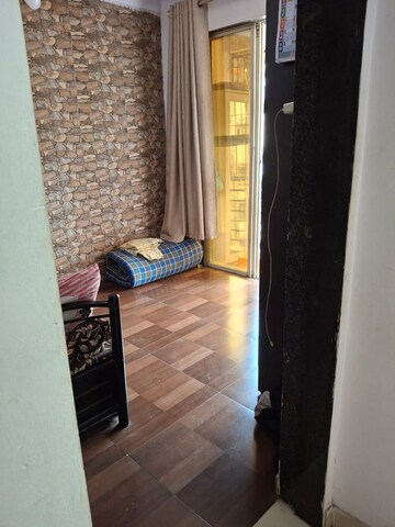 Living Room in 1 BHK Apartment at Dhanashree Devayani Galaxy, Sonar Pada – for Sale