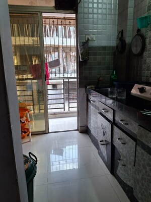 Kitchen in 1 BHK Apartment at Dhanashree Devayani Galaxy, Sonar Pada – for Sale