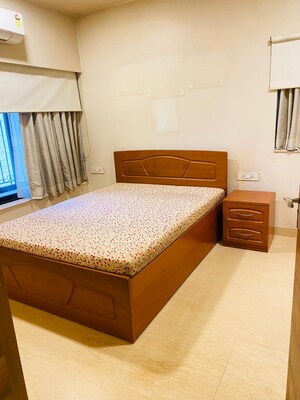 Bedroom in 2 BHK Apartment at Raheja Classique, Andheri West – for Sale