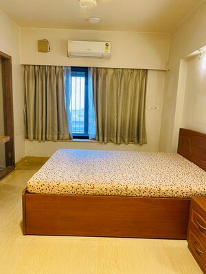 Bedroom in 2 BHK Apartment at Raheja Classique, Andheri West – for Sale