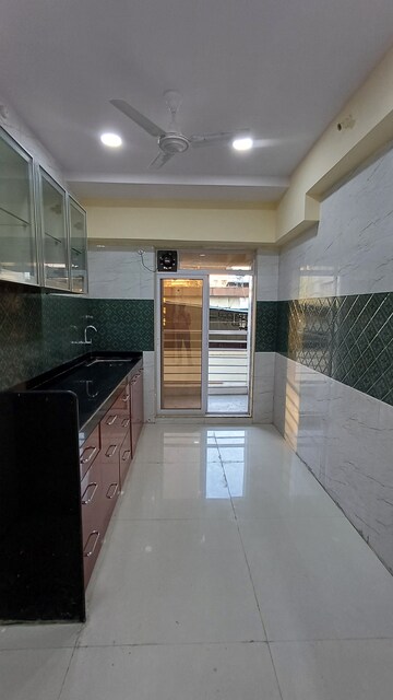 Kitchen in 2 BHK Apartment at Parijat Soceity, Panch Pakhadi – for Rent