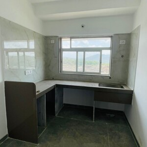 Kitchen in 1 BHK Apartment at Shraddha Evoque, Sonapur – for Sale