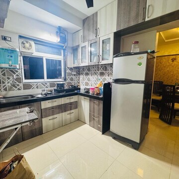 Kitchen in 3 BHK Apartment at Shraddha Evoque, Sonapur – for Rent