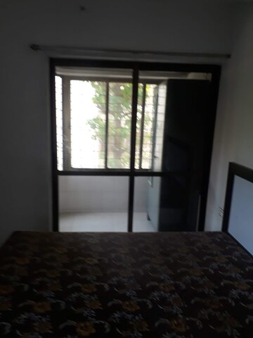 Room in 2 BHK Apartment at Jasmine Tower, Vasant Vihar – for Rent