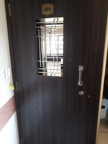Building Lobby in 2 BHK Apartment at Jasmine Tower, Vasant Vihar – for Rent