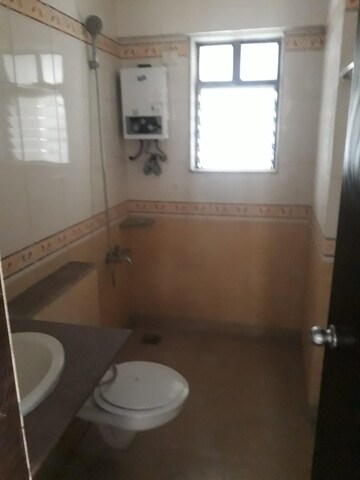 Bathroom in 2 BHK Apartment at Jasmine Tower, Vasant Vihar – for Rent