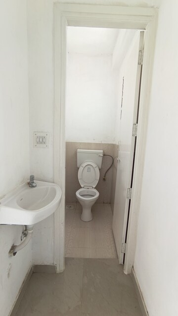 Bathroom in 1 BHK Apartment at Applewood Satyesh Residency, Shela – for Rent