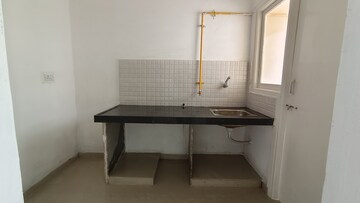 Kitchen in 1 BHK Apartment at Applewood Satyesh Residency, Shela – for Rent