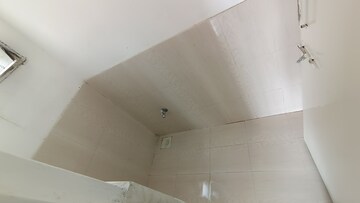Bathroom in 1 BHK Apartment at Applewood Satyesh Residency, Shela – for Rent