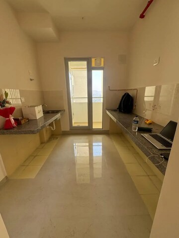 Kitchen in 2 BHK Apartment at Piramal Vaikunth, Balkum Pada – for Rent