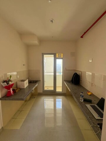 Kitchen in 2 BHK Apartment at Piramal Vaikunth, Balkum Pada – for Rent