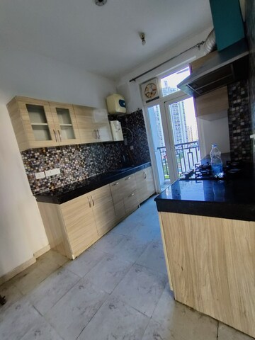 Kitchen in 3 BHK Apartment at Ansals Celebrity Greens, Sushant Golf City – for Rent