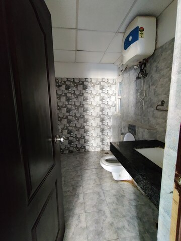 Bathroom in 3 BHK Apartment at Ansals Celebrity Greens, Sushant Golf City – for Rent