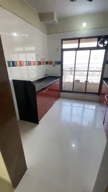 Kitchen in 2 BHK Apartment at Trishul Patel Heights, Ghansoli – for Rent