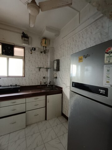 Kitchen in 2 BHK Apartment at Kanakia Hollywood, Versova – for Rent