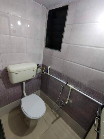 Bathroom in 1 BHK Apartment at Mulund East – for Sale