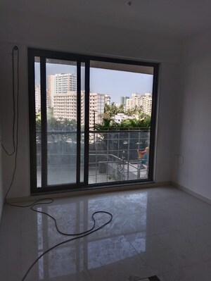 Room in 2 BHK Apartment at Keytech Jiten CHS, Andheri West – for Sale