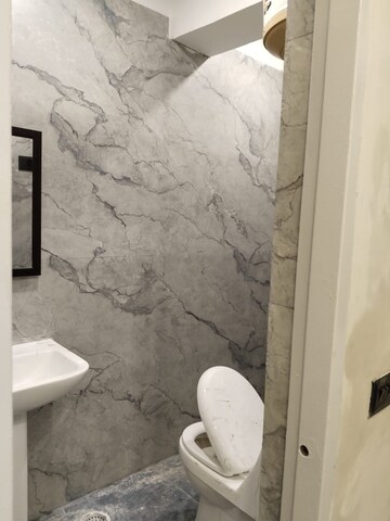 Bathroom in 1 RK Apartment at Emaar Emerald Floors Premier, Sector 65 – for Rent