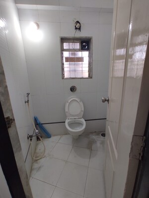 Bathroom in 1 BHK Apartment at Cosmos Lounge, Manpada – for Sale