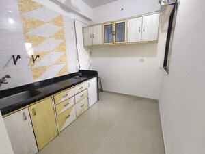 Kitchen in 1 BHK Apartment at Cosmos Lounge, Manpada – for Sale