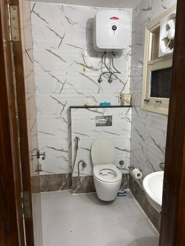 Bathroom in 2 BHK Builder Floor at Ansal Sushant Apartments, Sushant Lok I – for Rent