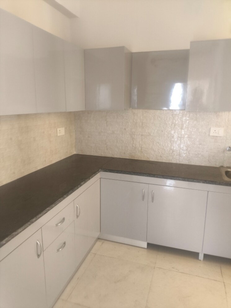 Kitchen, signature-global-proxima-phase-2 2 Bedroom 604 Sq.Ft. Apartment In Sector 89 Gurgaon 8637174