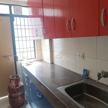 Kitchen in Studio Apartment at Emaar Palm Premier, Sector 77 – for Sale