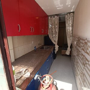 Kitchen in Studio Apartment at Emaar Palm Premier, Sector 77 – for Sale