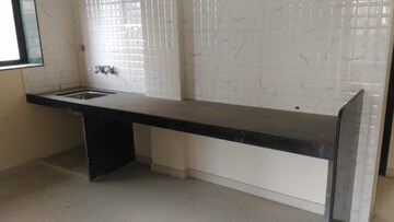 Kitchen in 2 BHK Apartment at Karve Nagar – for Sale