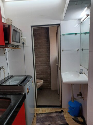 Bathroom in 1 RK Apartment at Navbharat Sahyog CHS, Goregaon East – for Rent