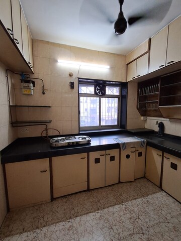 Kitchen in 2 BHK Apartment at Takshila CHS, Andheri East – for Rent