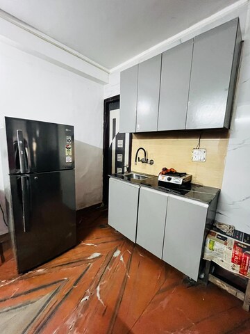 Kitchen in 1 RK Builder Floor at Freedom Fighters Enclave – for Rent
