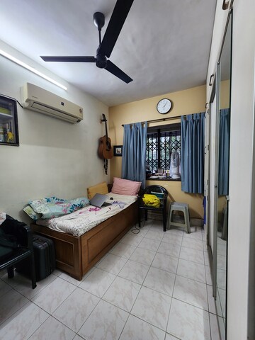 Living Room in 2 BHK Apartment at Alica Nagar CHS, Kandivali East – for Sale