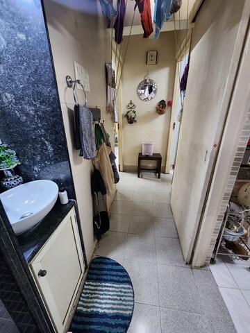 Team Area in 2 BHK Apartment at Alica Nagar CHS, Kandivali East – for Sale