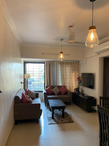 Living Room in 2 BHK Apartment at Kanakia Hollywood, Versova – for Rent