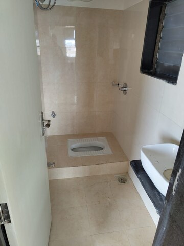 Bathroom in 2 BHK Apartment at Pranjee Garden City, Katrap – for Rent