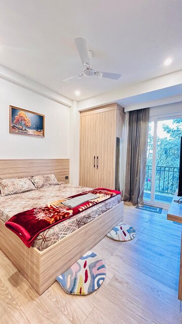 Bedroom in 1 BHK Builder Floor at Ansal Sushant Floors, Sushant Lok ii – for Rent
