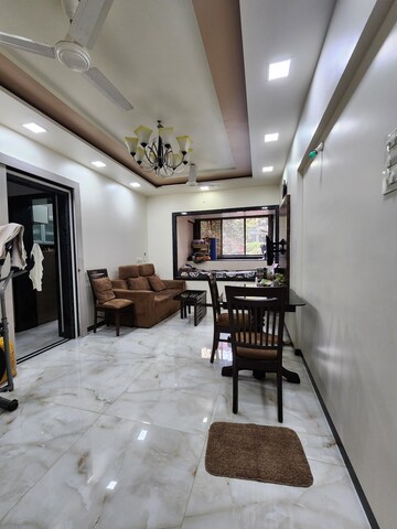 Living Room in 2 BHK Apartment at Green Meadows Bluilding 2 Chs Ltd, Kandivali East – for Sale