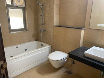 Bathroom in 4 BHK Apartment at Tata Raheja Raisina Residency, Sector 59 – for Sale